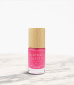 Nail Polish Non Toxic Color Caloca - Handmade Beauty Nail Polish Nail Polish Non Toxic Color Caloca Inspired by the pink algae that inhabit the rocks, Caloca is the summer pink, bright and fun. Size: 11 ml Formulation The perfect dose of pigments in the formulation guarantees a covering effect. Contains ingredients specifically designed to strengthen nail’s resistance like organic silicon. Easy Apply Fast and precise application due to its brush.  An ergonomic cap for easy use. How to use: to obtain an o