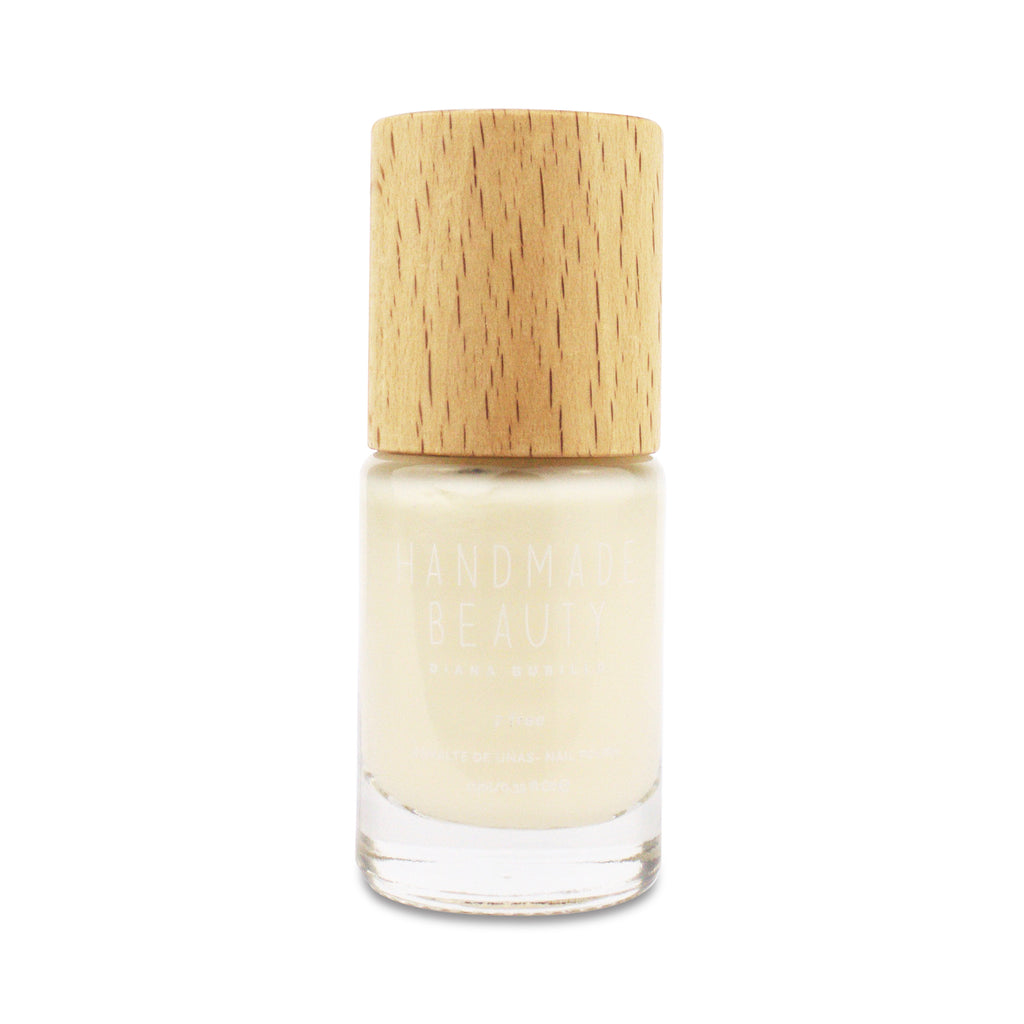 Nail Polish Non Toxic Color Coconut - Handmade Beauty Nail Polish Nail Polish Non Toxic Color Coconut As the interior of the coconut, translucent white, pure, soft and delicate. Size: 11 ml Formulation The perfect dose of pigments in the formulation guarantees a covering effect. Contains ingredients specifically designed to strengthen nail’s resistance like organic silicon. Easy Apply Fast and precise application due to its brush.  An ergonomic cap for easy use. How to use: to obtain an optimal result by