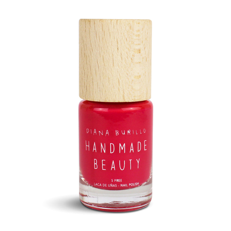 Nail Polish Non Toxic Color Grapefruit - Handmade Beauty Nail Polish Nail Polish Non Toxic  Color Grapefruit Inspired by the grapefruit, a red-orange, citric, able to elevate the spirit when looking at it. Size: 10 ml Formulation The perfect dose of pigments in the formulation guarantees a covering effect. Contains ingredients specifically designed to strengthen nail’s resistance like organic silicon. Easy Apply Fast and precise application due to its brush.  An ergonomic cap for easy use. How to use: t