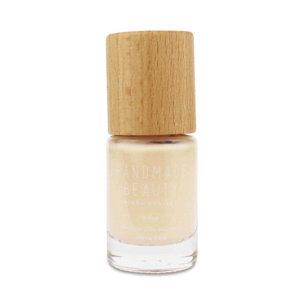 Nail Polish Non Toxic Color Jicama - Handmade Beauty Nail Polish Nail Polish Non Toxic Color Jicama Off-white color, bright and transparent, like the Mexican tuber of the same name. Size: 11 ml Formulation The perfect dose of pigments in the formulation guarantees a covering effect. Contains ingredients specifically designed to strengthen nail’s resistance like organic silicon. Easy Apply Fast and precise application due to its brush.  An ergonomic cap for easy use. How to use: to obtain an optimal resul