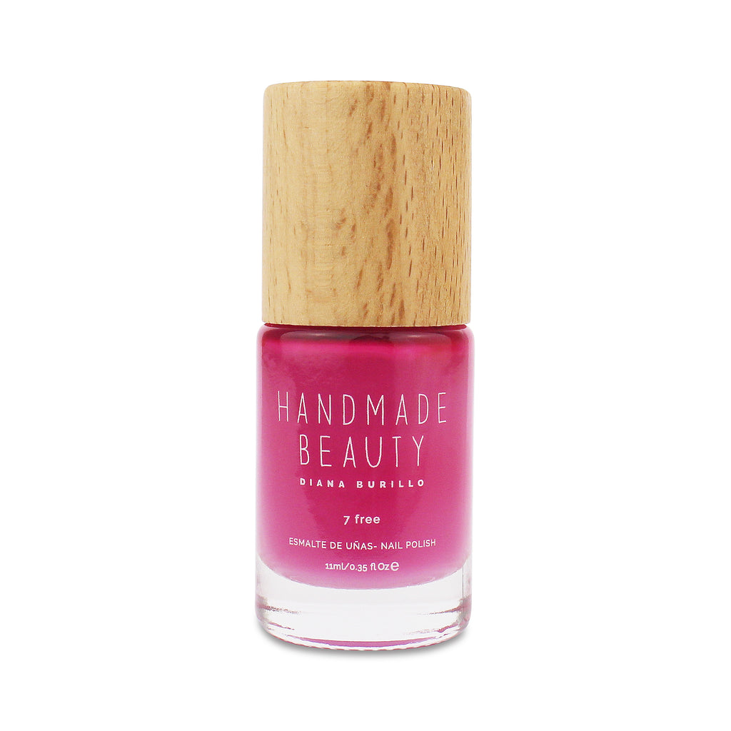 Nail Polish Non Toxic Color Pitaya - Handmade Beauty Nail Polish Nail Polish Non Toxic Color Pitaya Inspired by the exotic Dragon Fruit, this crimson pink color is able to empower our hands. Size: 11 ml Formulation The perfect dose of pigments in the formulation guarantees a covering effect. Contains ingredients specifically designed to strengthen nail’s resistance like organic silicon. Easy Apply Fast and precise application due to its brush.  An ergonomic cap for easy use. How to use: to obtain an opti