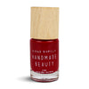 Nail Polish Non Toxic Color Pomegranate - Handmade Beauty Nail Polish Nail Polish Non Toxic Color Pomegranate  Garnet tone as the precious stones of the same name. Dark red reminiscent of the mysterious interior of pomegranates. Size: 11 ml Formulation The perfect dose of pigments in the formulation guarantees a covering effect. Contains ingredients specifically designed to strengthen nail’s resistance like organic silicon. Easy Apply Fast and precise application due to its brush.  An ergonomic cap for 