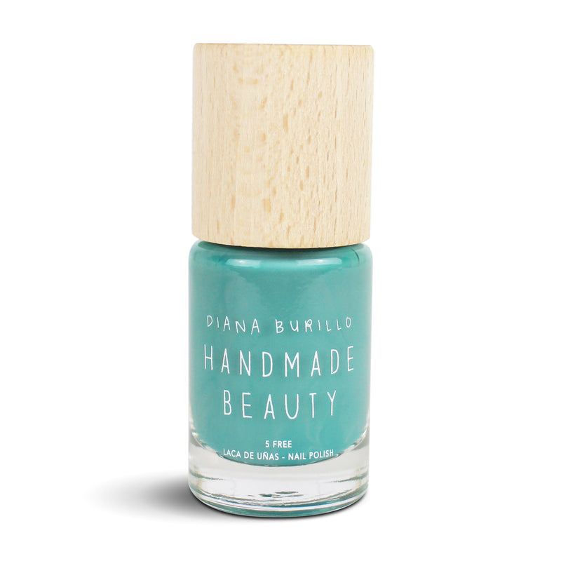 Nail Polish Non Toxic Color Shitake - Handmade Beauty Nail Polish Nail Polish Non Toxic  Color Shitake An original and unique tone within the range of greens, inspired by oriental mushrooms, mosses and sage. Size: 10 ml Formulation The perfect dose of pigments in the formulation guarantees a covering effect. Contains ingredients specifically designed to strengthen nail’s resistance like organic silicon. Easy Apply Fast and precise application due to its brush.  An ergonomic cap for easy use. How to use
