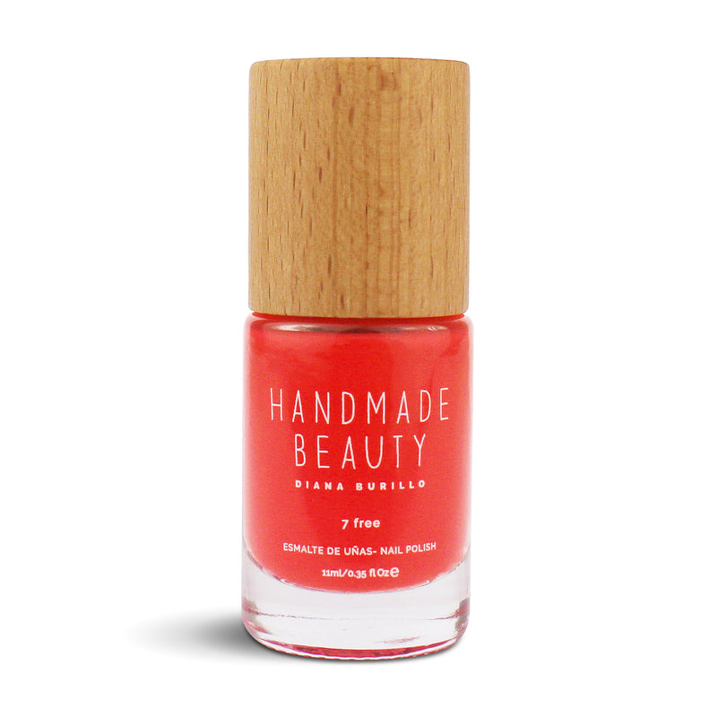 Nail Polish Non Toxic Color Tangerine - Handmade Beauty Nail Polish Nail Polish Non Toxic Color Tangerine Coral full of vitality and intensity. A refreshing and fun color that brings joviality to hands and feet. Size: 11 ml Formulation The perfect dose of pigments in the formulation guarantees a covering effect. Contains ingredients specifically designed to strengthen nail’s resistance like organic silicon. Easy Apply Fast and precise application due to its brush.  An ergonomic cap for easy use. How to u